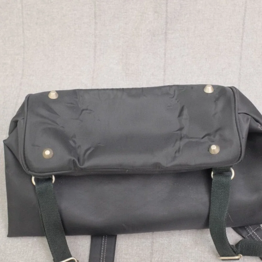 Ebel Black Nylon Faux Leather Turn Lock Cinch‎ Top Travel Backpack